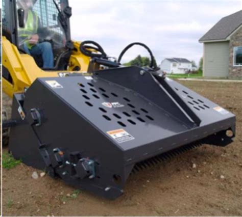 rent a skid steer and rockhound|rock rake attachment rental.